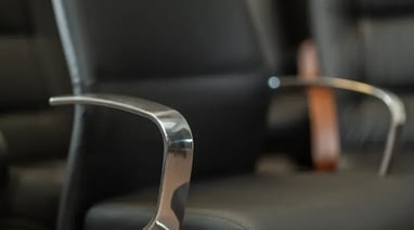 staffing-black-leather-seat-closeup-900x500