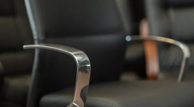 staffing-black-leather-seat-closeup-900x500